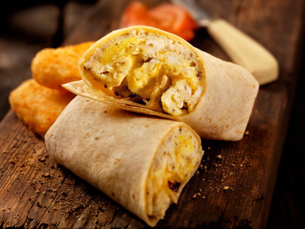 Scrambled Egg and Cheese Breakfast Wrap on table