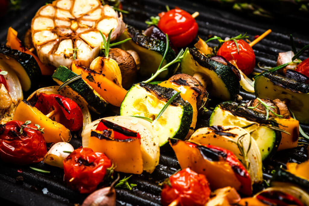 BBQ Grilled vegetables on Skewers with Fresh Herbs and Spices. Summer Barbecue Food