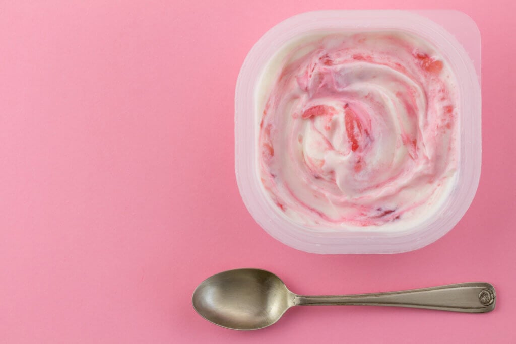 Yogurt cup with natural strawberry Greek style yogurt swirled with real strawberries