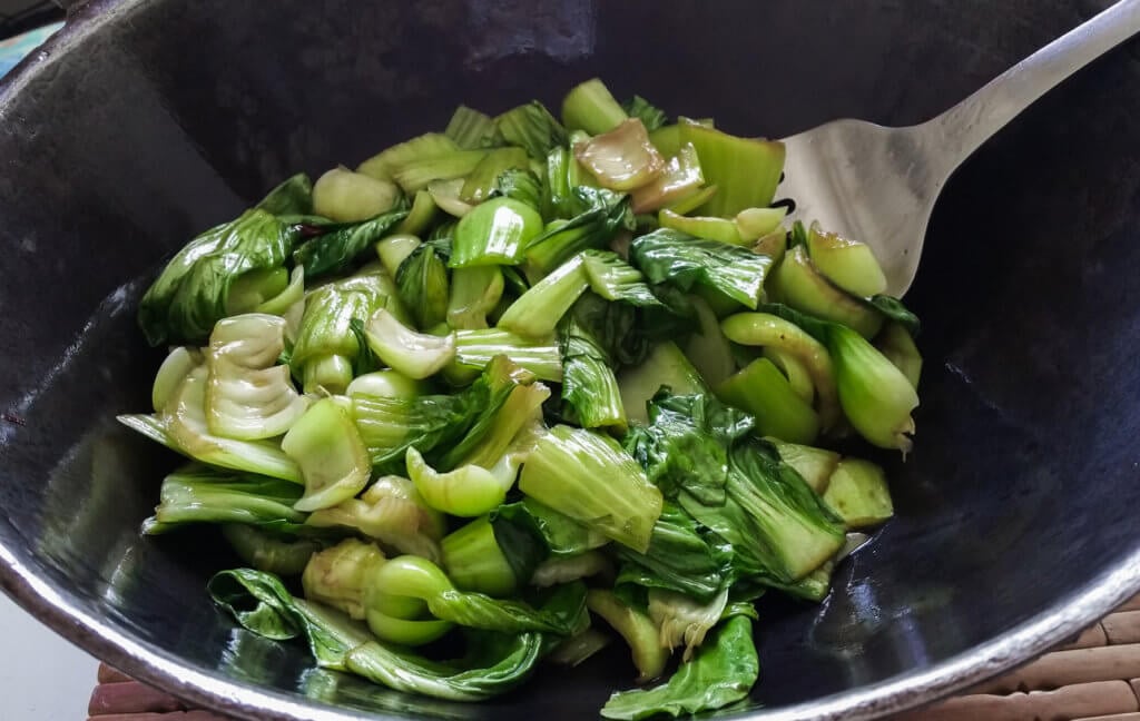 Boy choy pieces in a frying pan