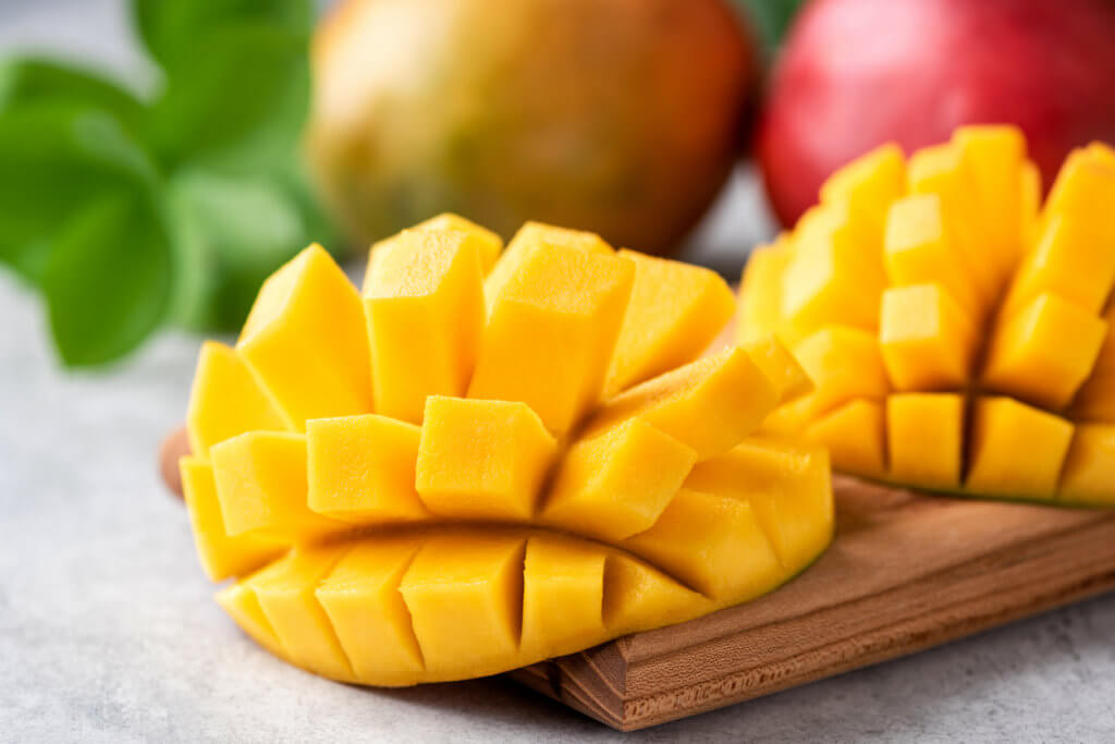 Fresh Ripe Mango Cut In Cubes. Tasty Juicy Tropical Fruit
