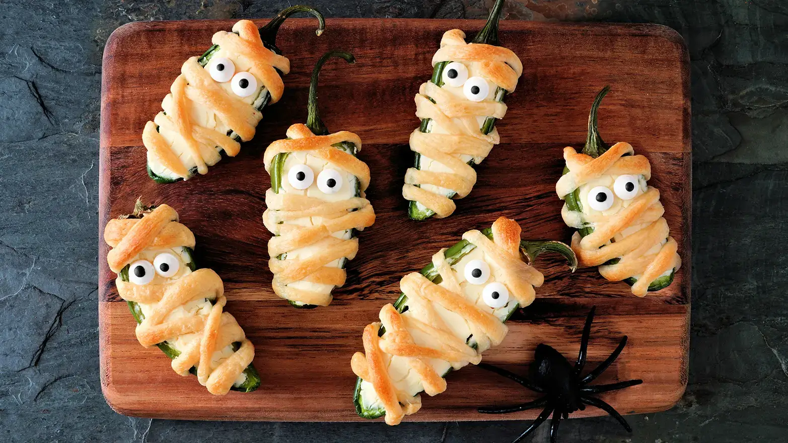 Jalapeno poppers  wrapped in pastry dough with edible eyeballs