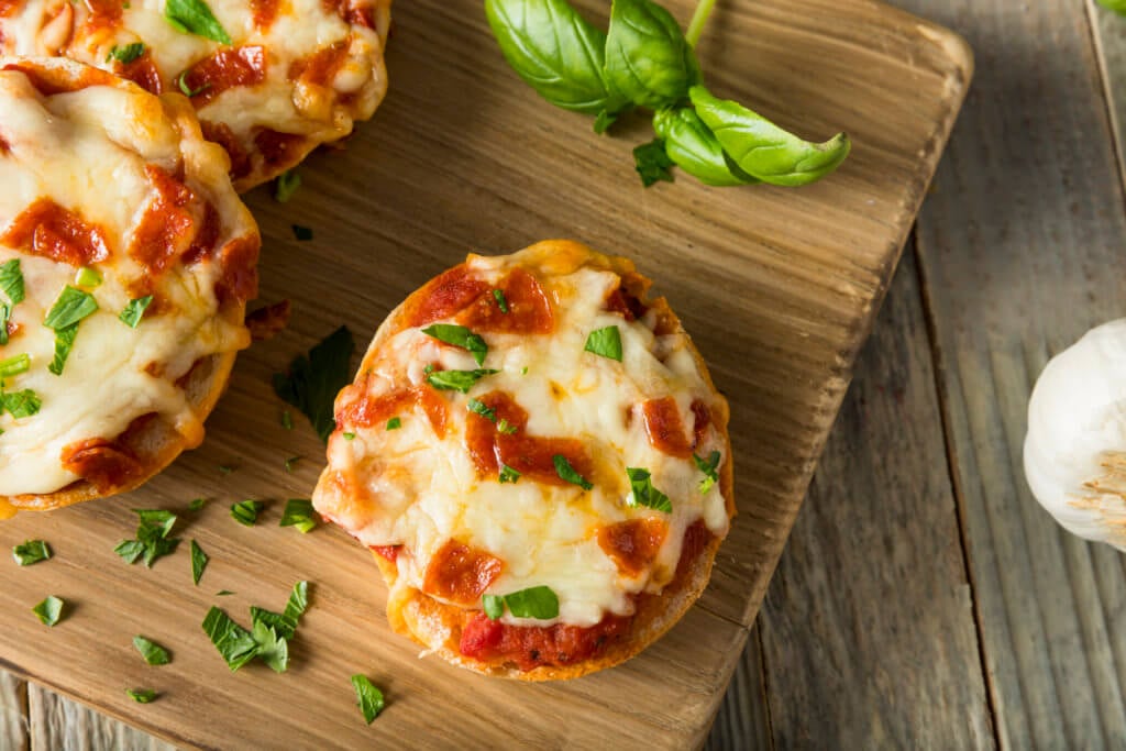 Homemade Pepperoni Mini Pizza Bagels with Basil