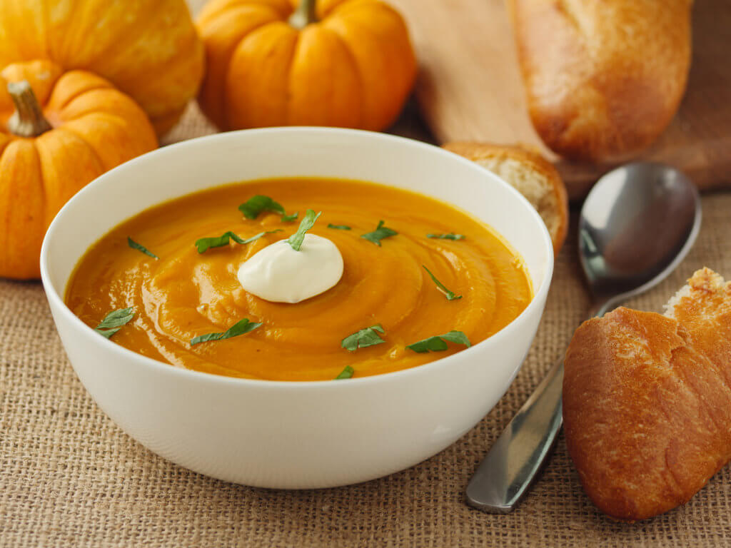 Home made fresh pumpkin soup with crispy bread and sour cream.