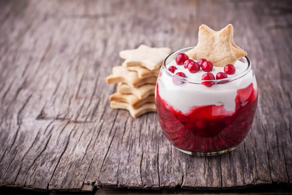 Parfait with cranberry sauce and cream