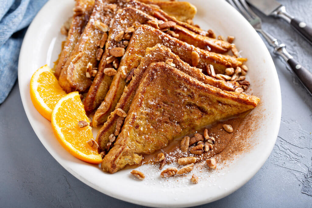 Cinnamon pecan french toasts with coffee for breakfast