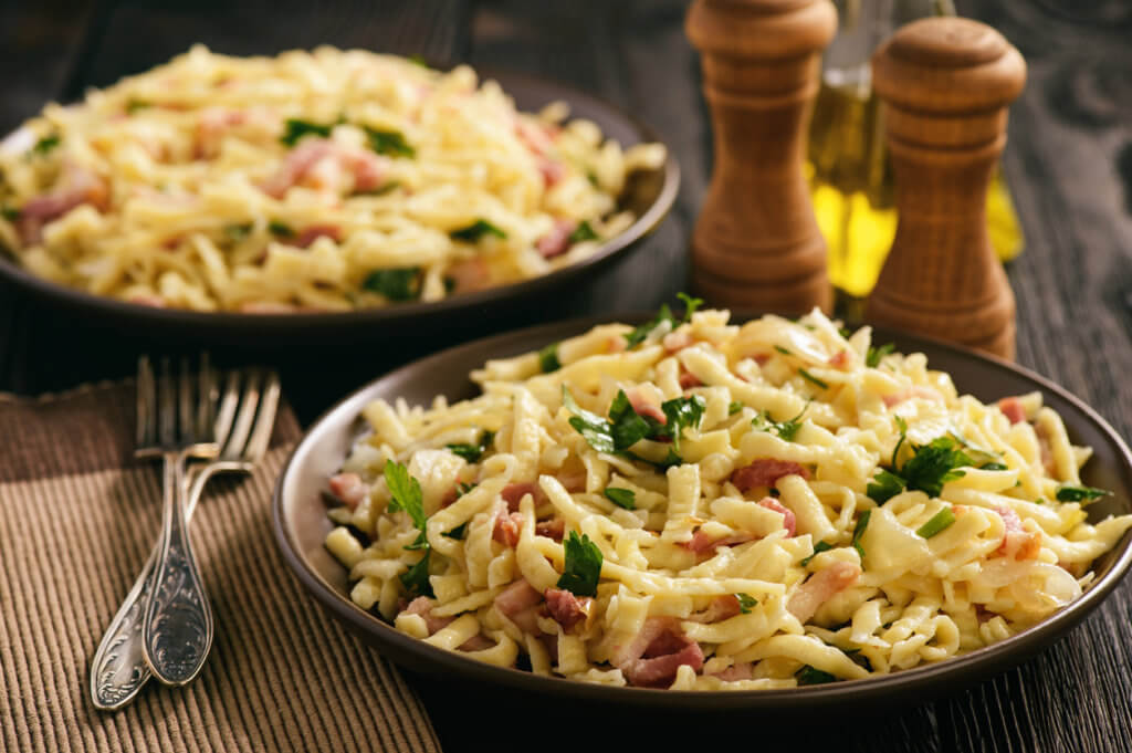 Spaetzle with bacon and onion,german style cuisine.