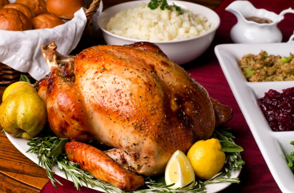 Roast turkey on a holiday dinner table.