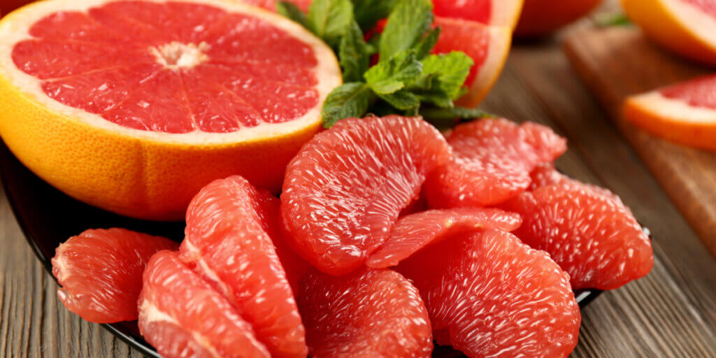 Grapefruit slices in a bowl.