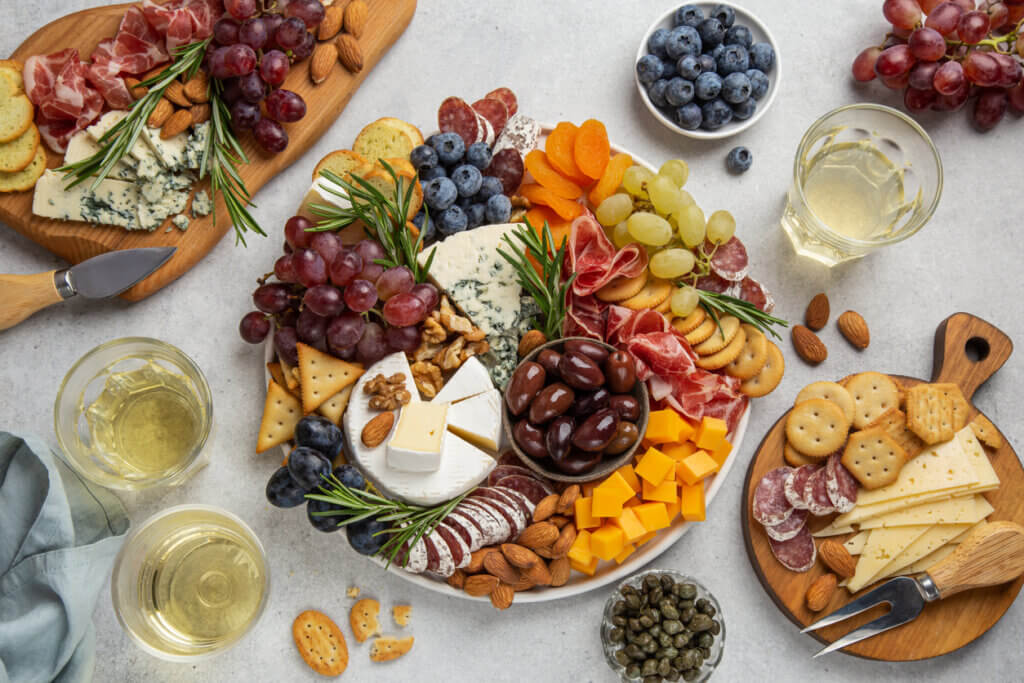 Charcuterie and cheese board. Assortment of appetizers or antipasti. Top view.