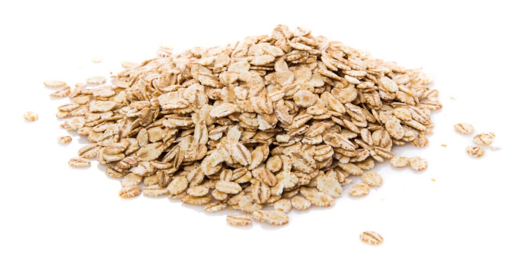 Oats, grocery store produce, on a blank background.