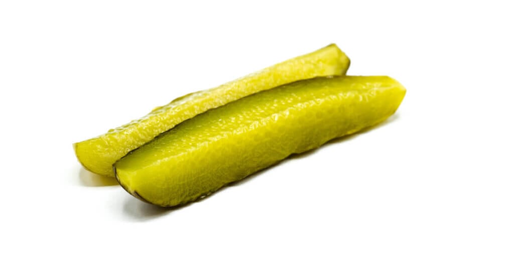 Gherkin Pickle, grocery store produce, on a blank background.
