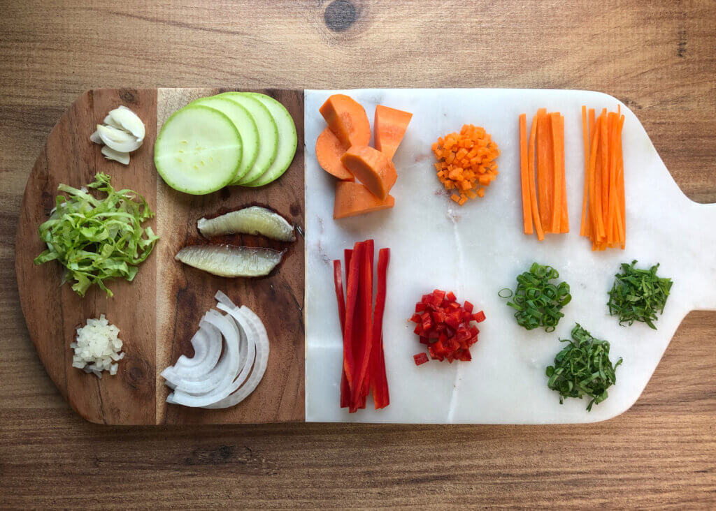 Cutting Knife Skills and Types on Marble and Wooden Board with Vegetables