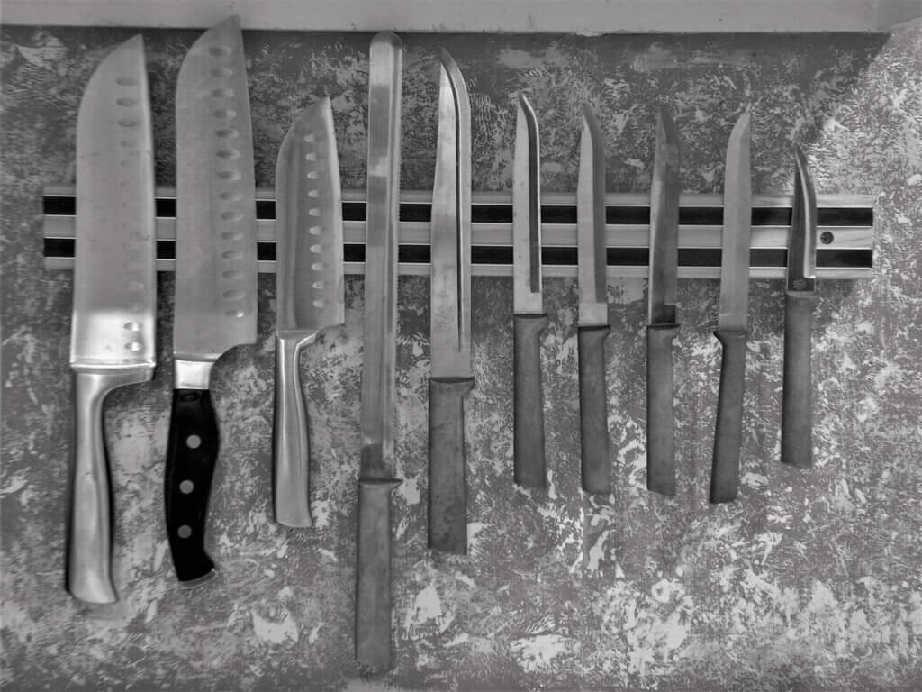 Chef's Knives are hanging on Magnetic Storage Bar 