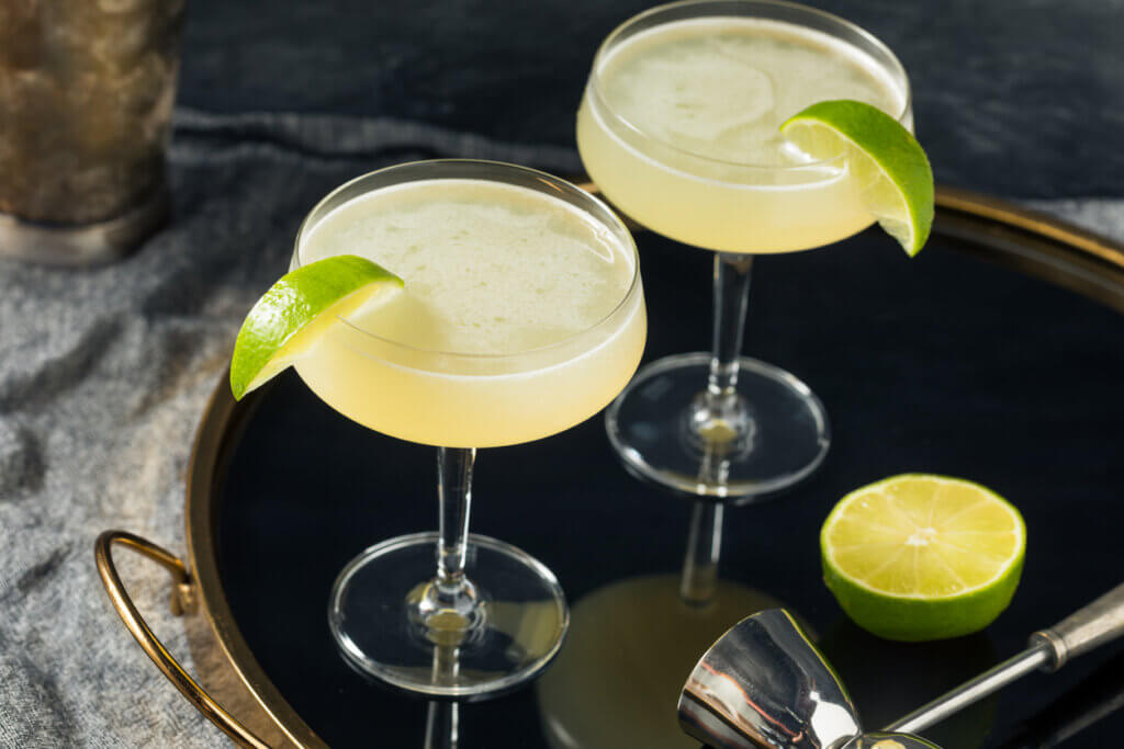 Refreshing Boozy Gimlet Cocktail with a Lime Garnish