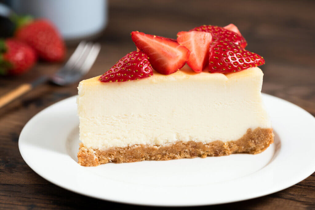 Cheesecake slice with strawberries. 