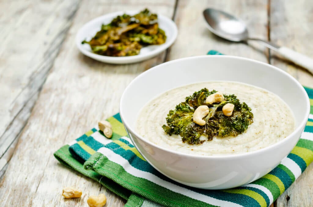 cauliflower kale soup with kale chips and cashews