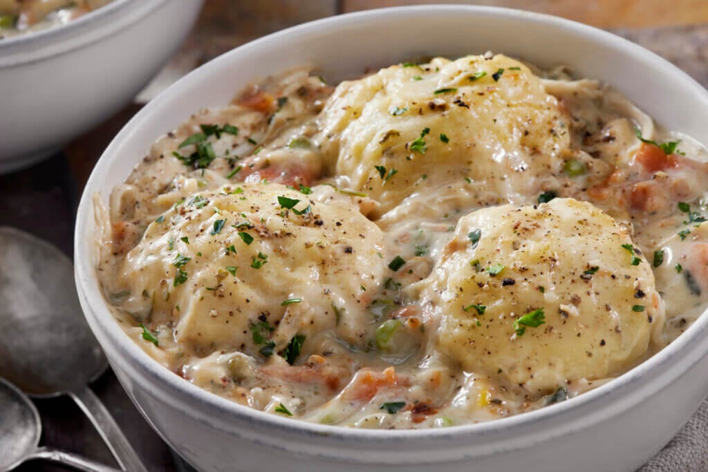 Creamy Chicken and Dumplings with Roast Chicken, Green Peas, Celery and Carrots