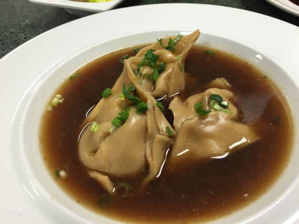 A delicate wild mushroom filling is wrapped in a delicate wonton wrapper and poached in a rich indulgent mushroom broth