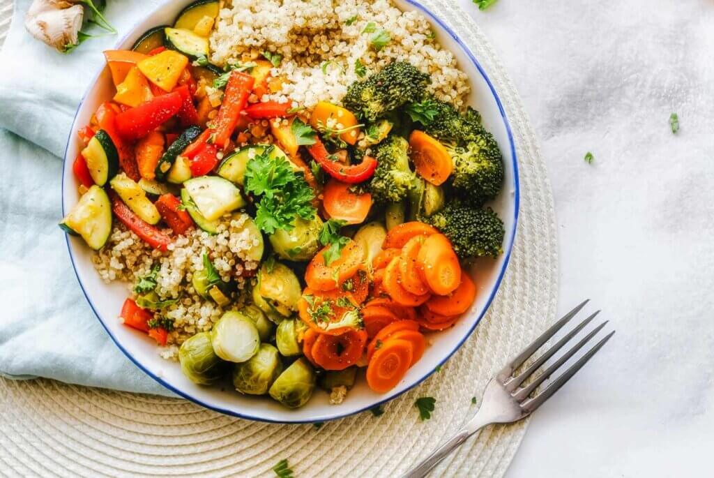 Above view of a roasted vegetables and quinoa bowls