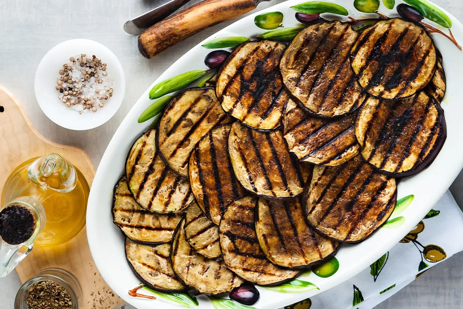 grilled eggplant on large white plate