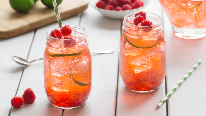 fresh iced tea with raspberries and cucumber