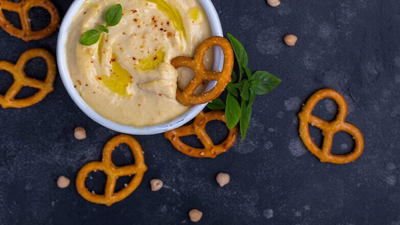 Pretzels and hummus make for a salty and savory pair.  