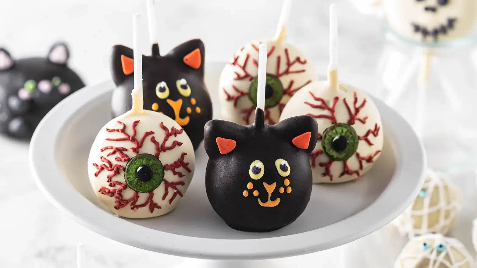 Black cat and eyeball cake pops for Halloween dessert
