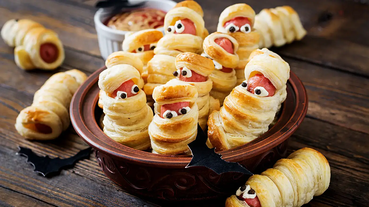 Hot dogs wrapped in pastry dough with edible eyeballs