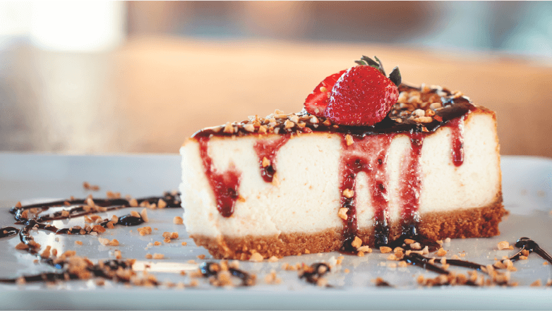 cheesecake with cottage cheese filling topped with a strawberry