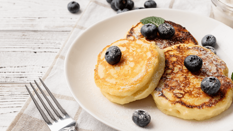 cottage cheese pancakes topped with blueberries