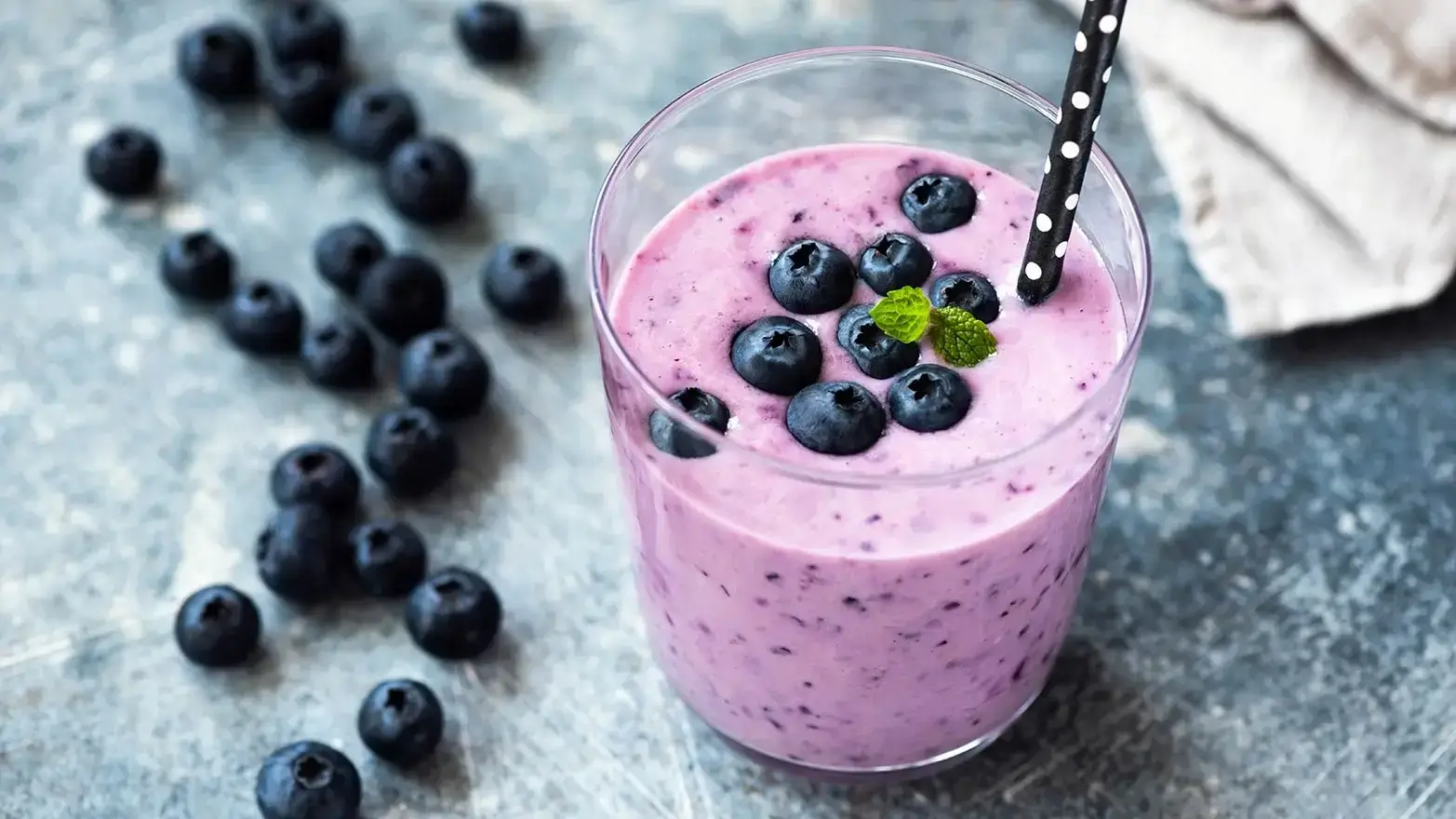 blueberry smoothie with extra berries on top