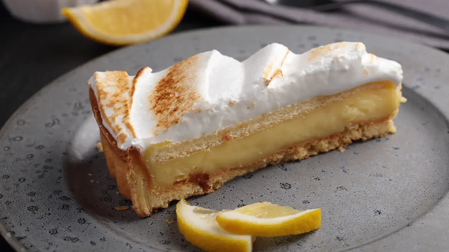 Slice of lemon meringue cheesecake