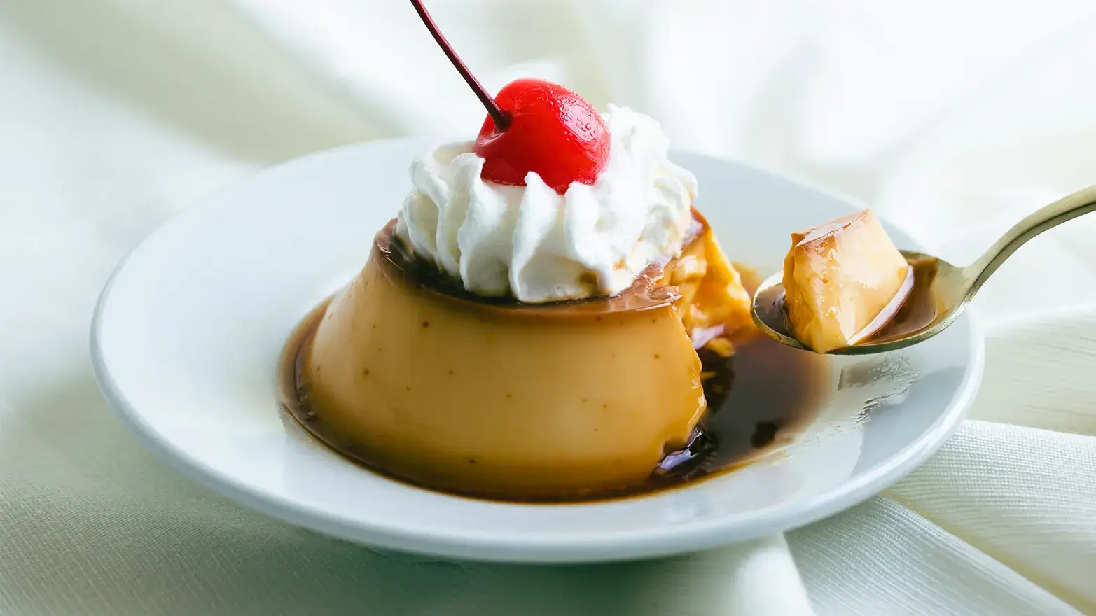 Flan with bourbon whipped cream